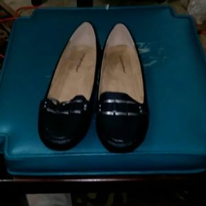 Black slip on shoes with small wedge heel